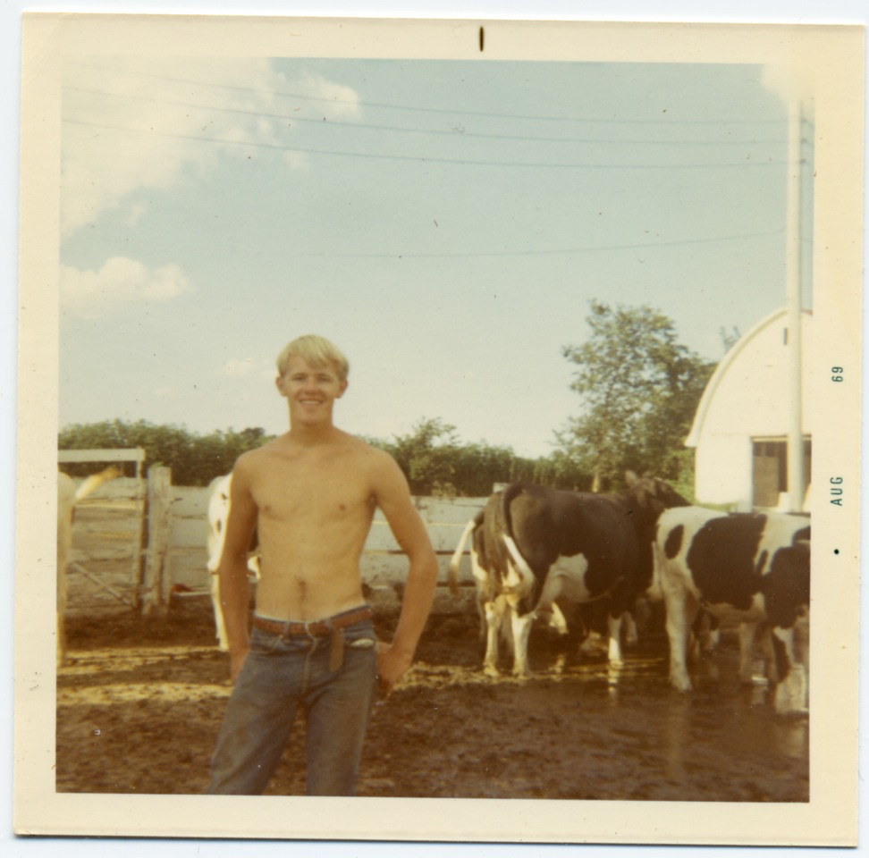 john with cows 20 years